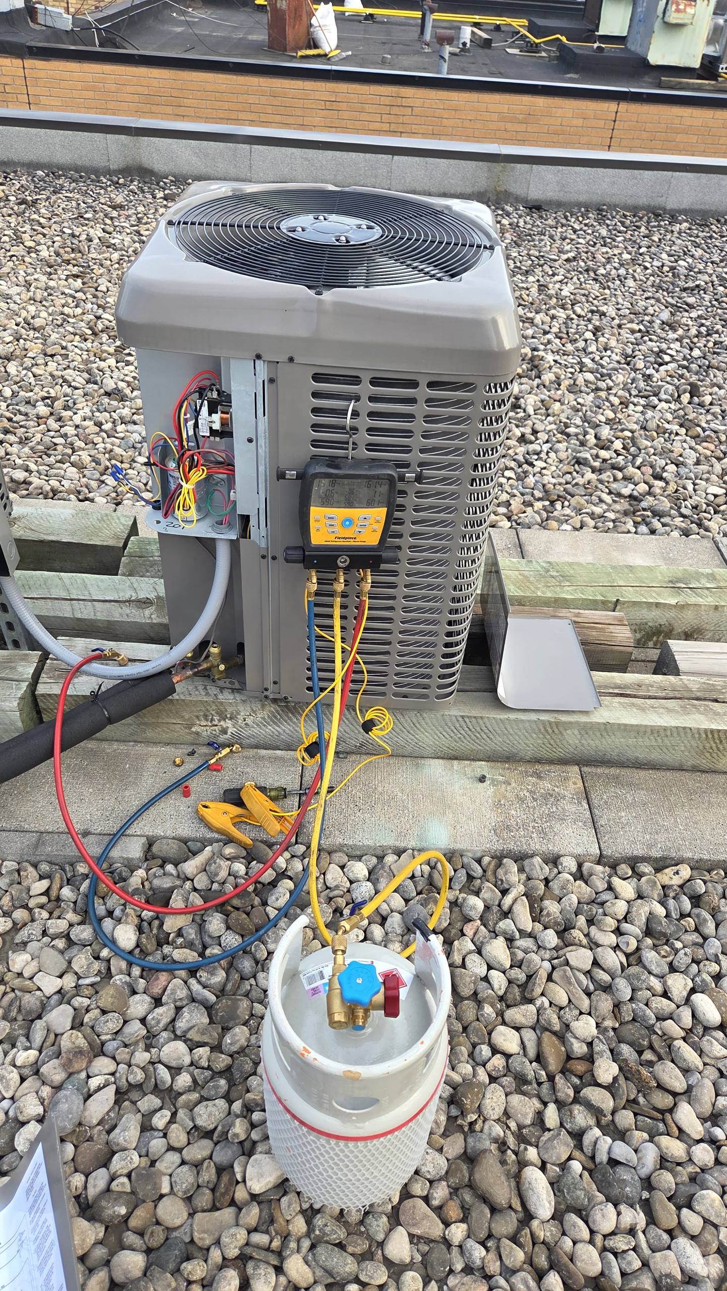 Rooftop commercial cooling diagnostics by OLU HVAC.
