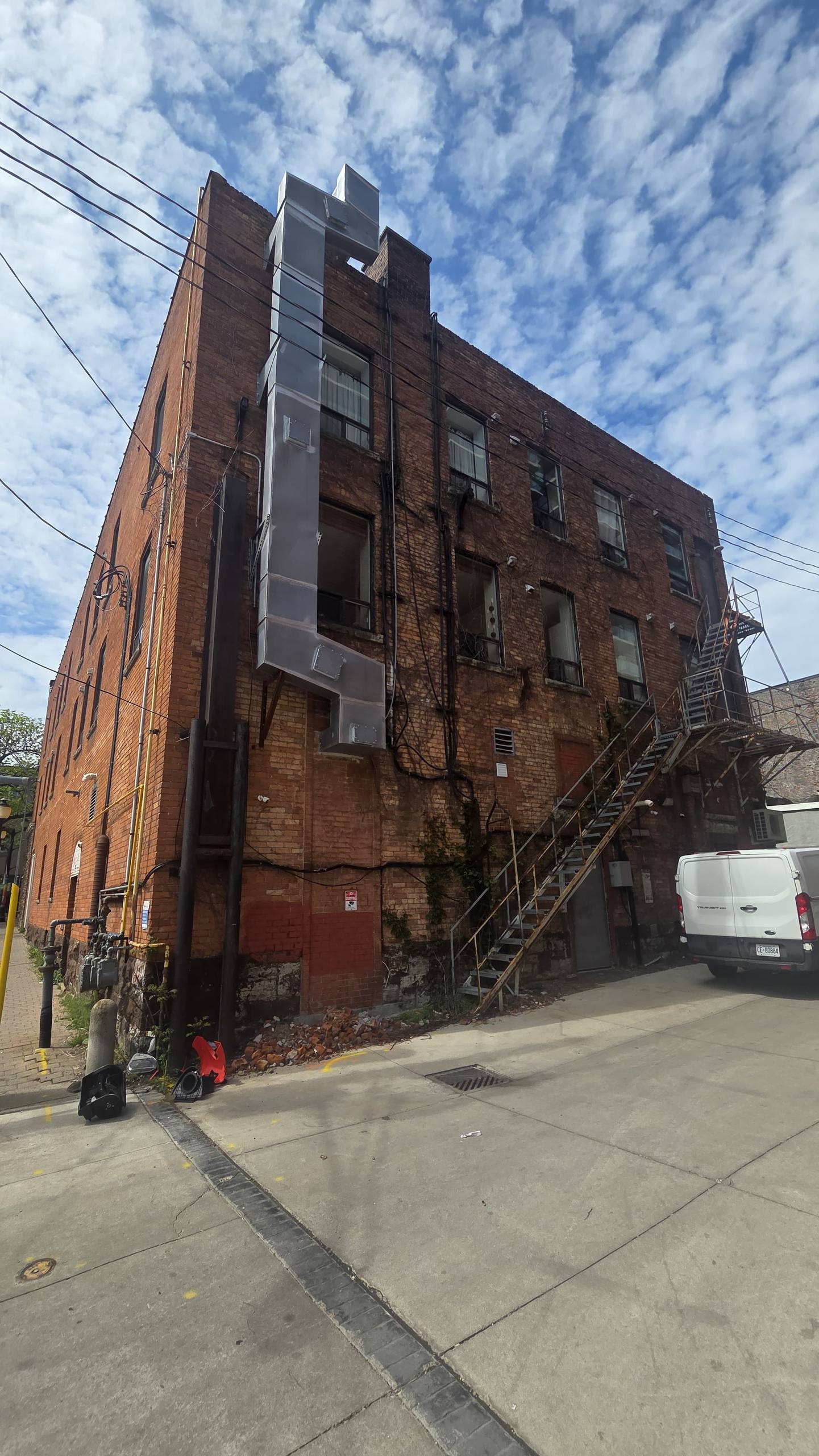 Commercial exterior ductwork and rooftop connection work.