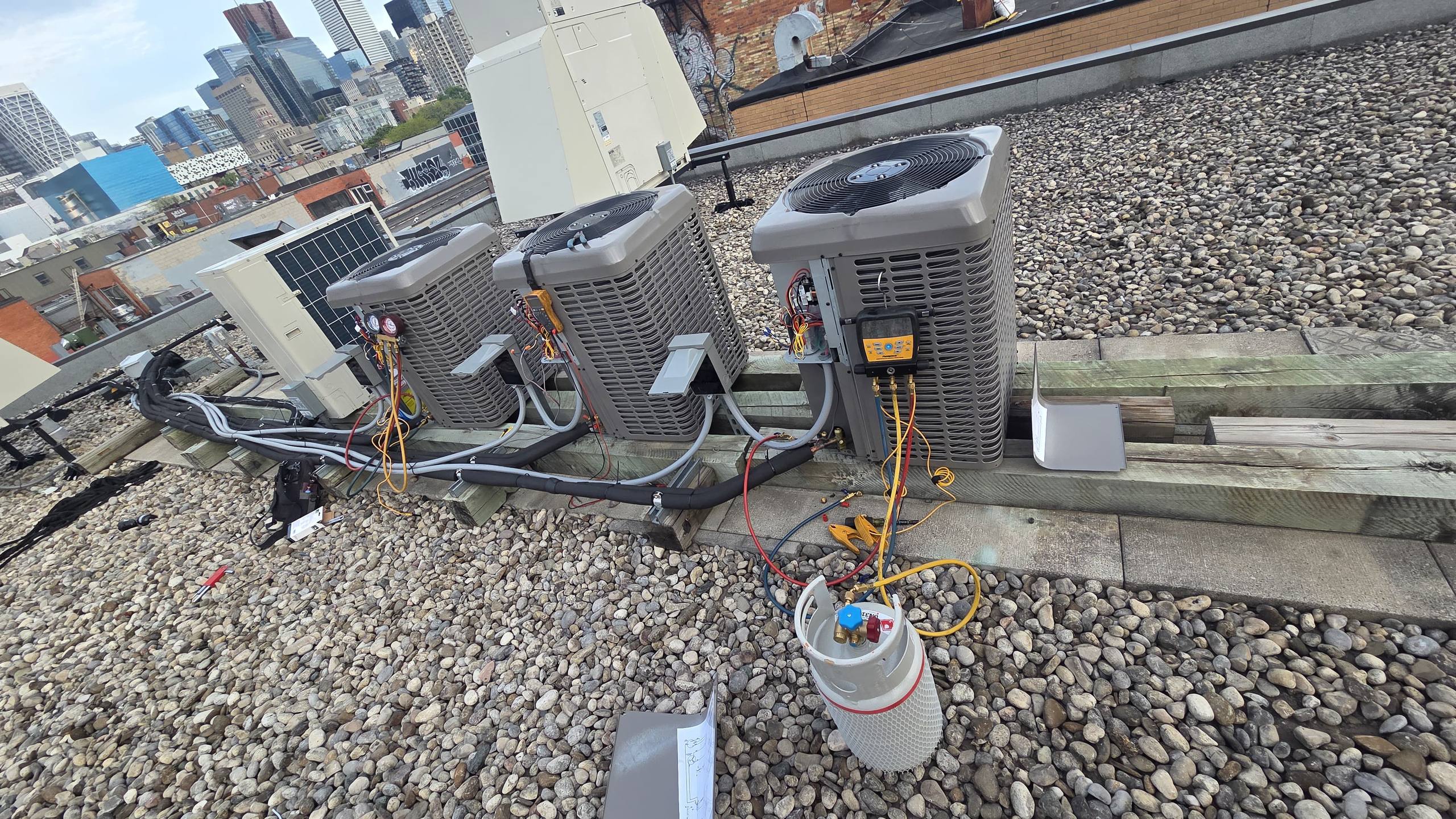 Commercial rooftop HVAC units serviced by OLU HVAC.