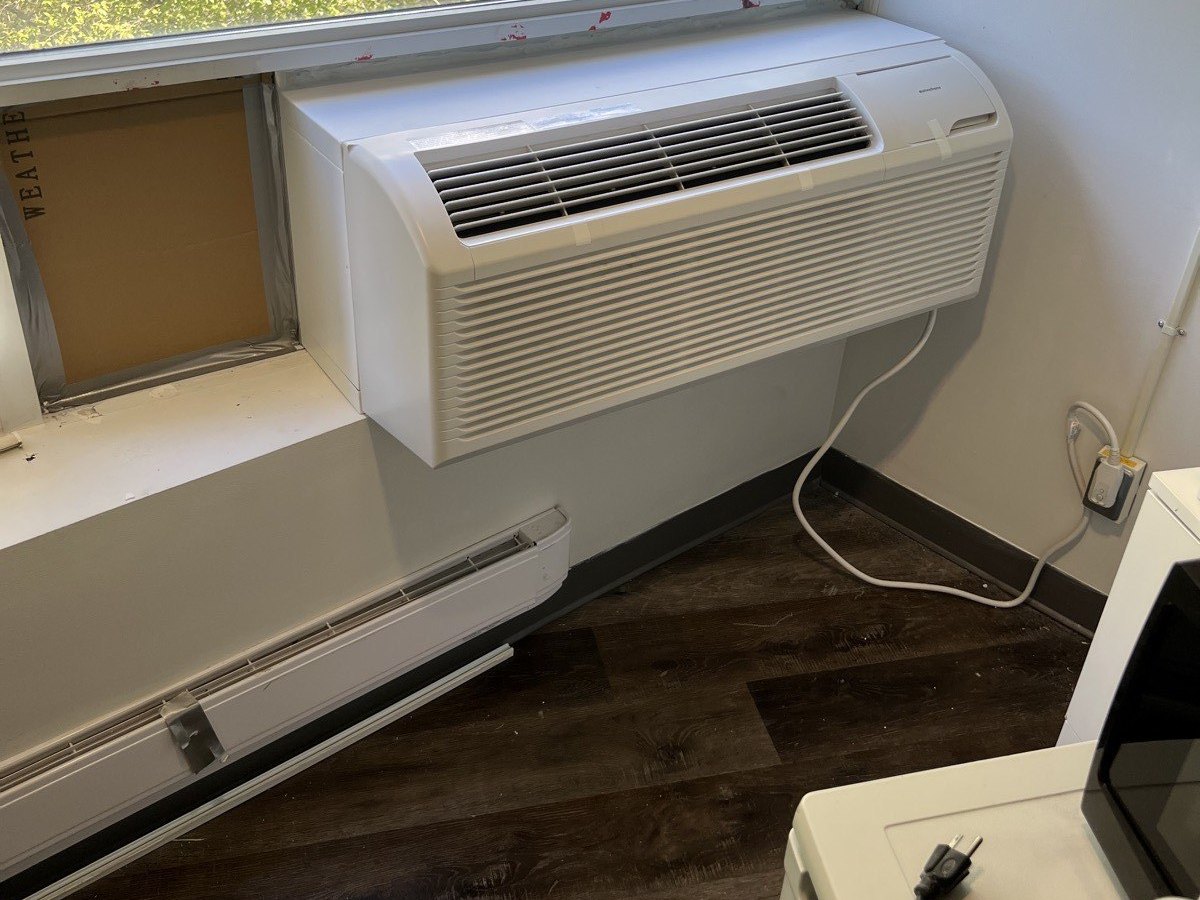 Central AC outdoor equipment installed for a Mississauga-area home.