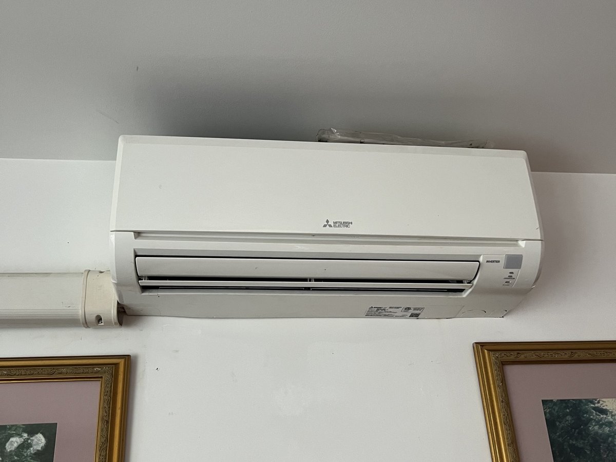Residential outdoor AC equipment checked by OLU HVAC.