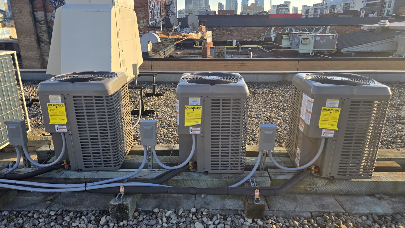 Commercial wall-mounted AC units serviced by Olu HVAC Inc. in Toronto and the GTA