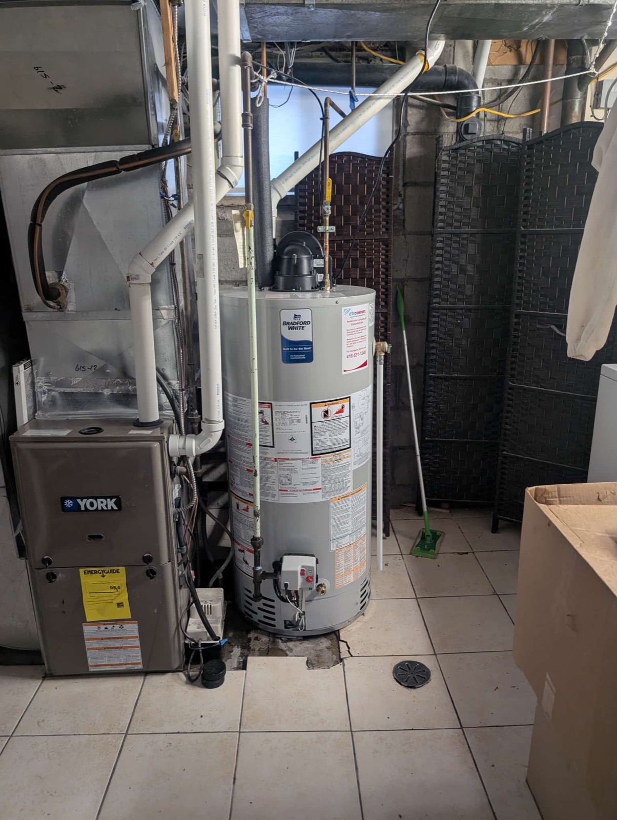 OLU HVAC technician on site for heating and cooling service.